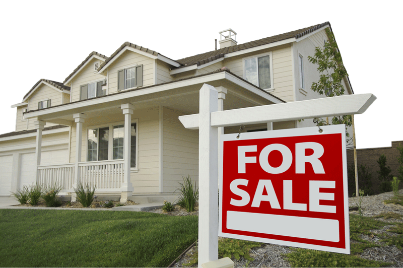 House with a For Sale sign in the front yard, representing property listings and real estate inspection services.